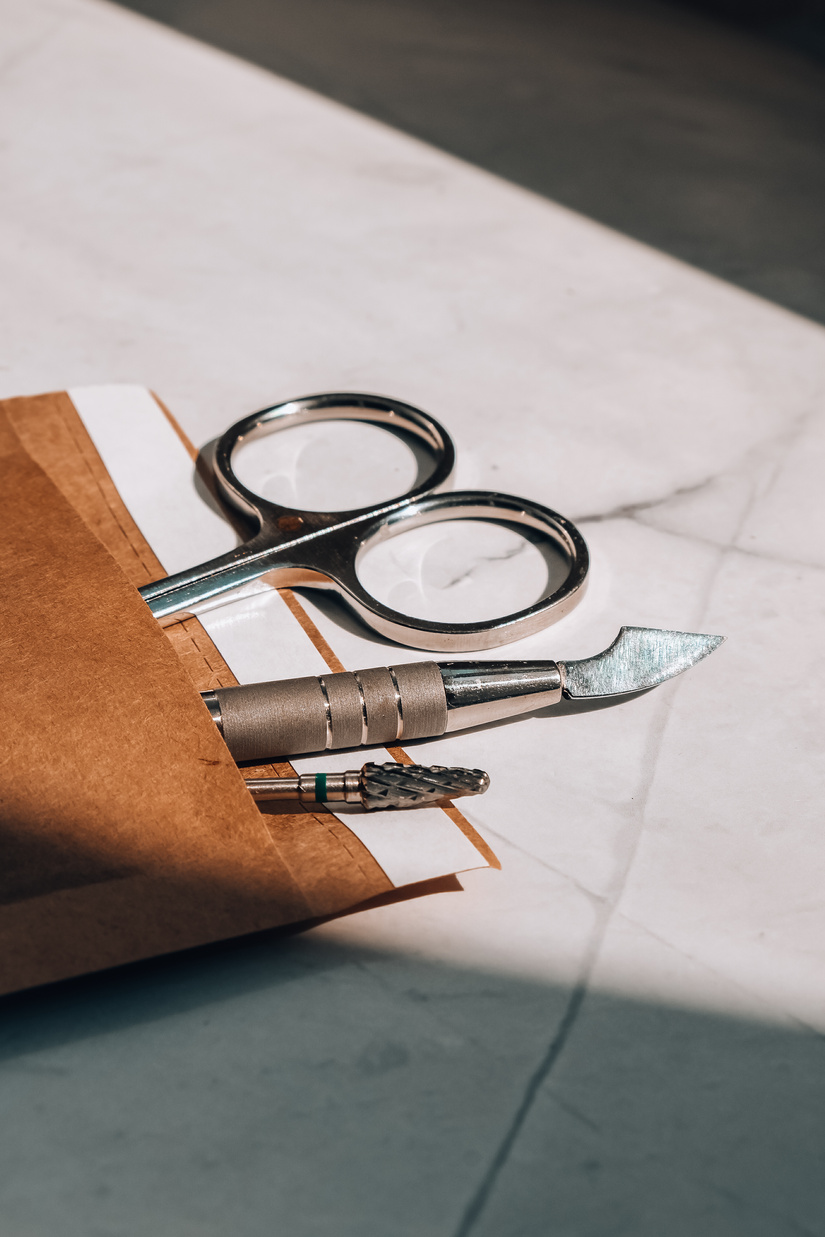 Clean Manicure Instruments. Manicure Set in Paper Heat Dry Bag for Sterilization. Sterilization of Instruments Healthcare Concept